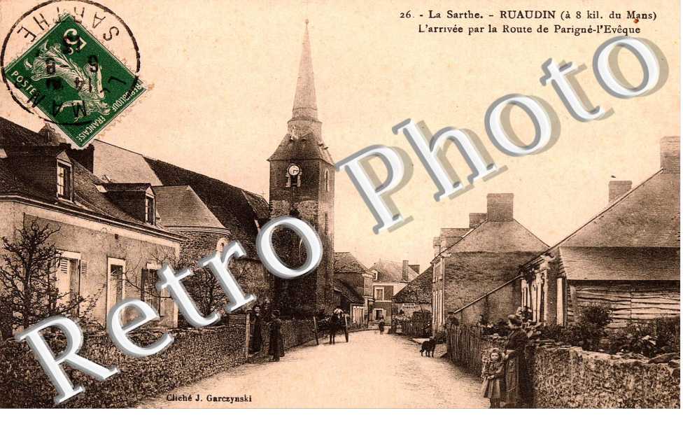 l'arrivée par la route de Parigné-l'Evêque en 1913