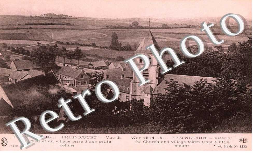 vue de l'eglise et du village prise d'une petite colline