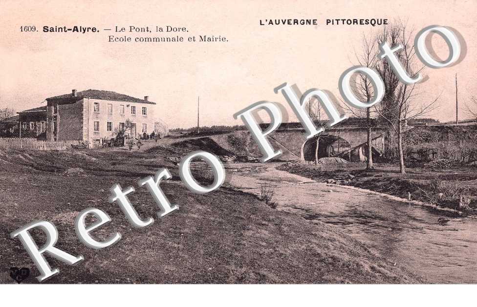 le pont , la Dore, ecole communale et mairie