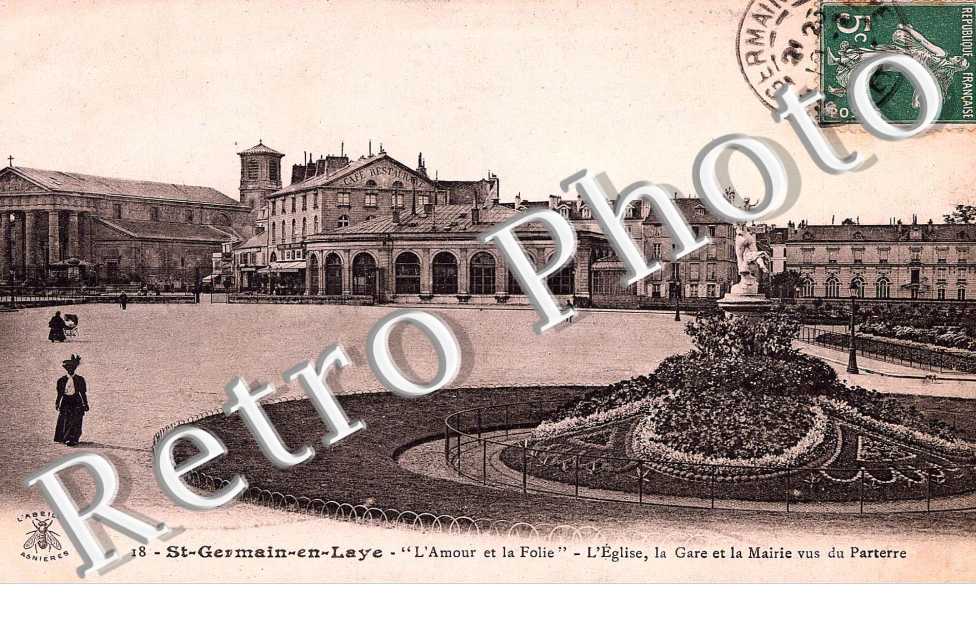 l'amour et la folie  L'eglise, la gare et la mairie vus du parterre.