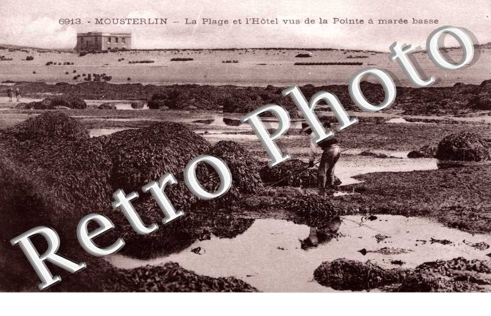 Mousterlin, la plage et l'hotel vus de la pointe a maree basse