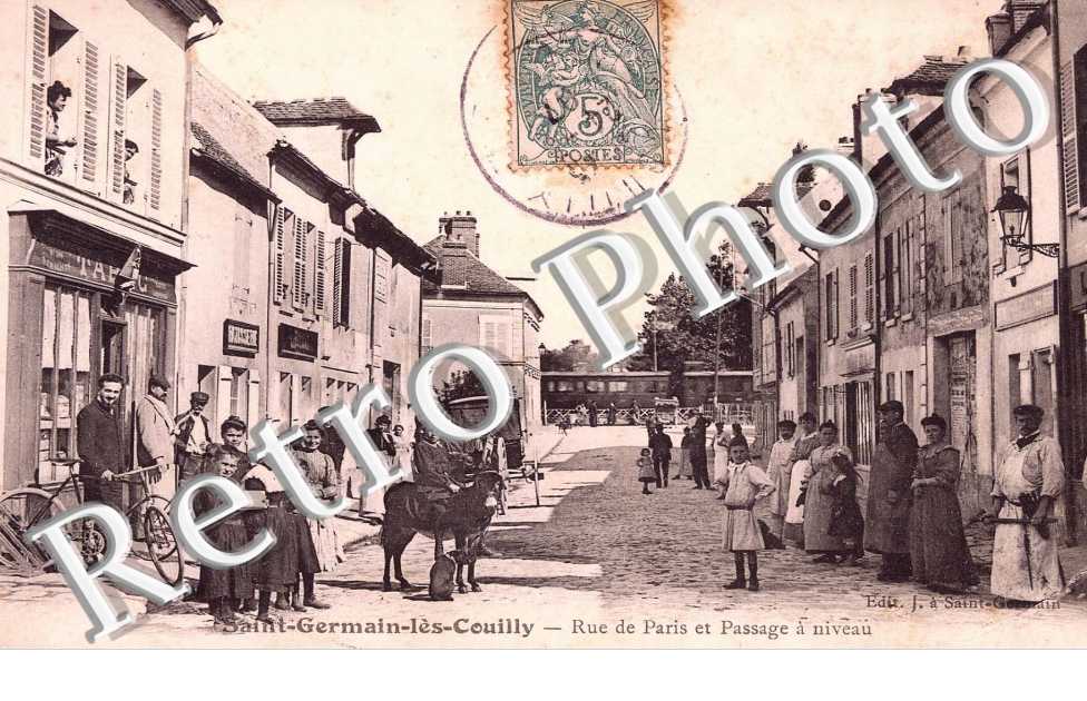 Saint Germain les Couilly - Rue de Paris et passage a niveau