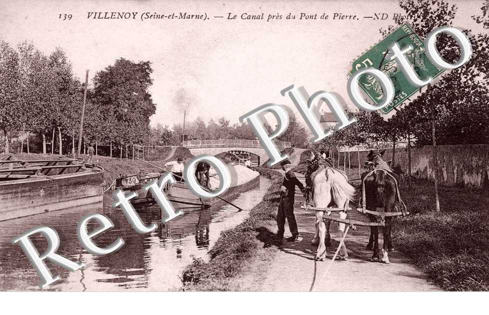 Le canal pres du pont de pierre - peniche - attelage de chevaux