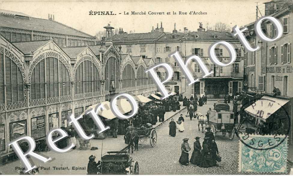 LE MARCHE COUVERT ET LA RUE D'ARCHES