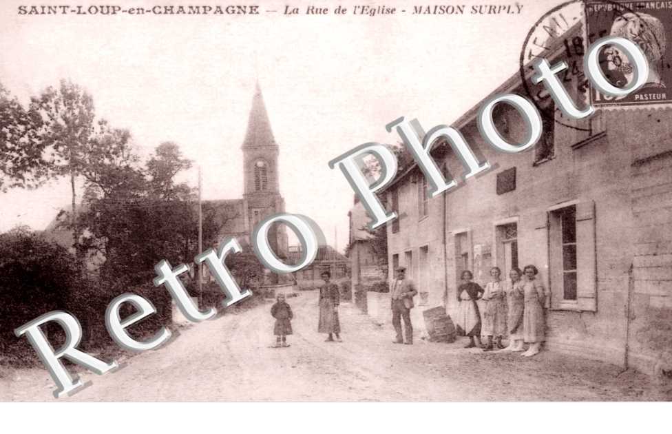 LA RUE DE L'EGLISE MAISON SURPLY
