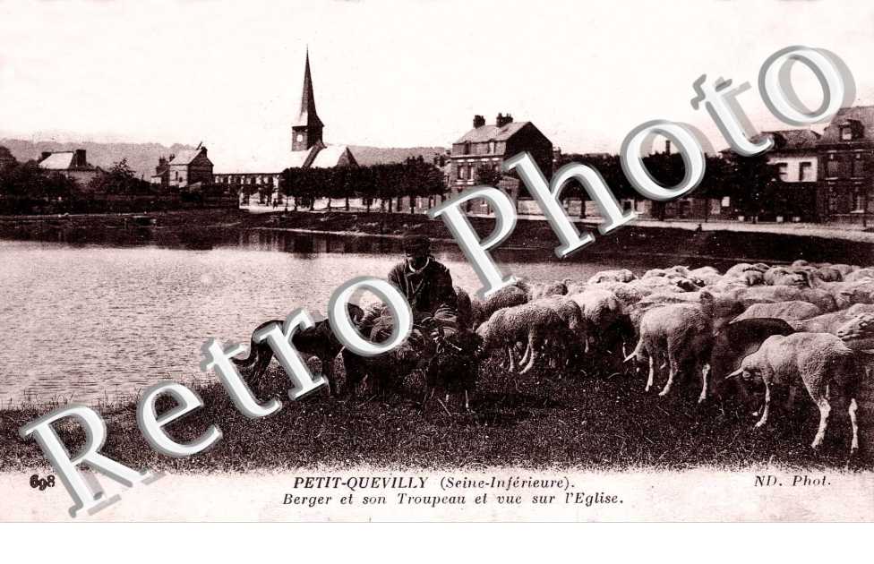 Un berger et son troupeau et vue sur l'eglise