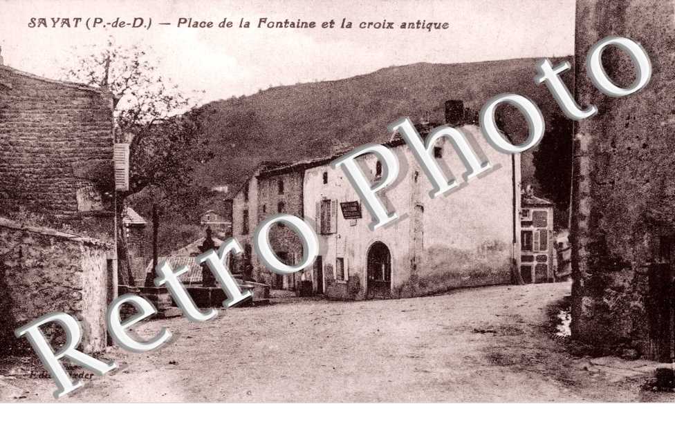 Place de la fontaine et la croix antique