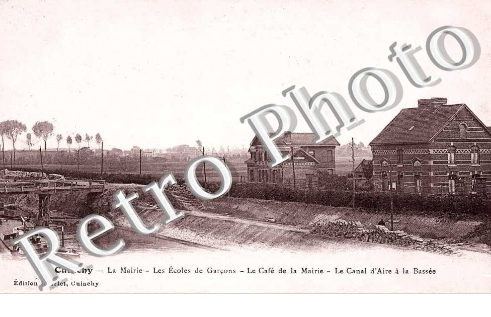 la mairie, les ecoles de garcons, le cafe de la mairie, le canal d' Aire a la Bassee