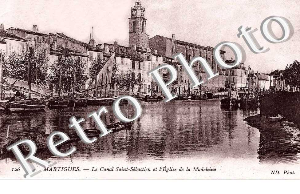 le canal saint sebastien et l'eglise de la madeleine