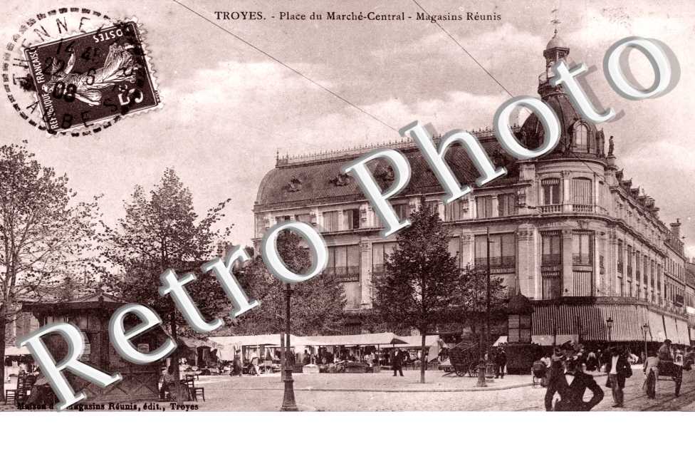 Place du Marche-Central, Magasins Reunis
