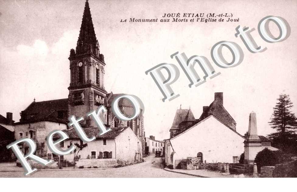 ETIAU Le monument aux morts et l'église de Joué
