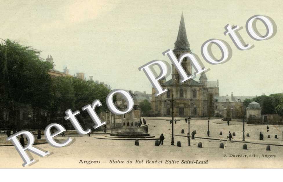 Statue du Roi Rene et Eglise Saint Laud
