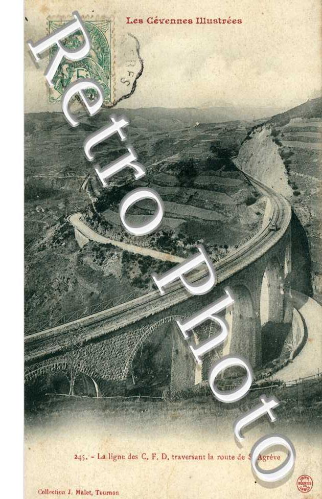 la ligne des C.F.D. traversant la route de Saint-Agreve