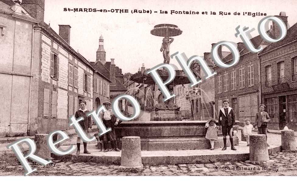 la fontaine et rue de l'eglise