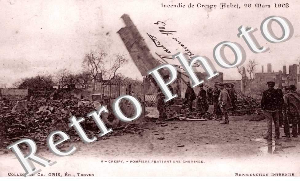 Incendie du 26 mars 1903, Pompiers abattant une cheminee