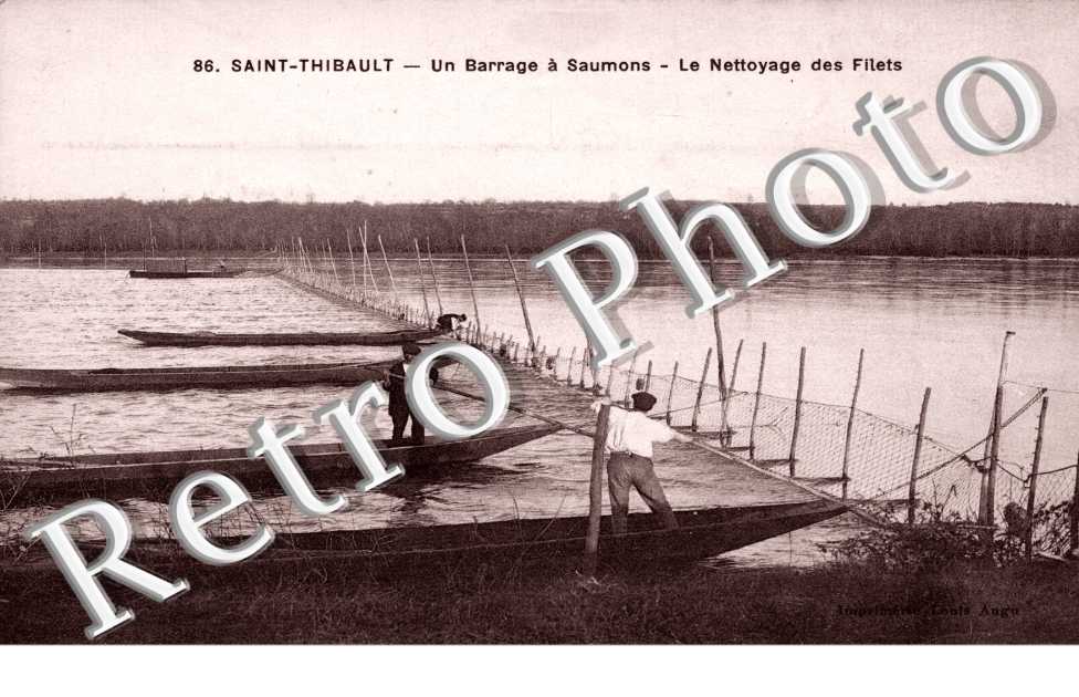 Saint Thibault, un barrage a saumons le nettoyage des filets