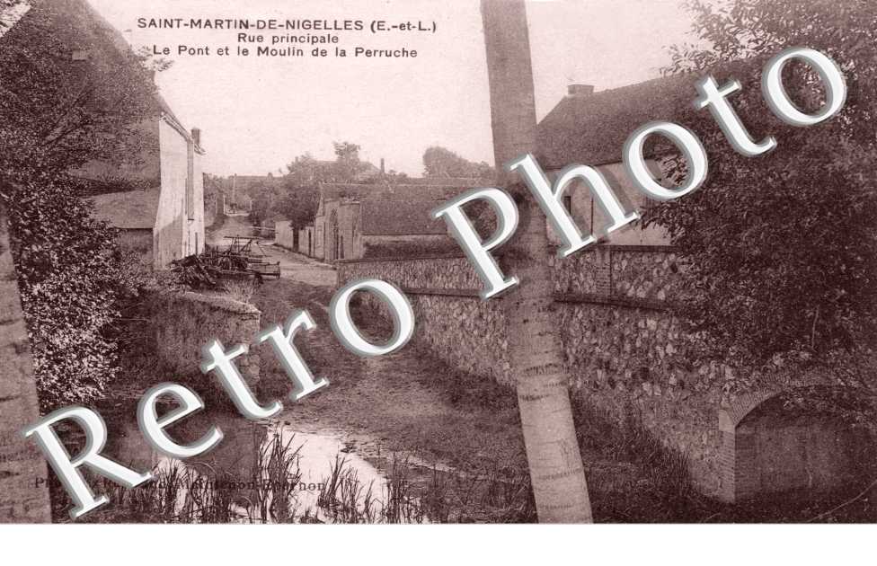 Rue principale - pont et le moulin de la perruche
