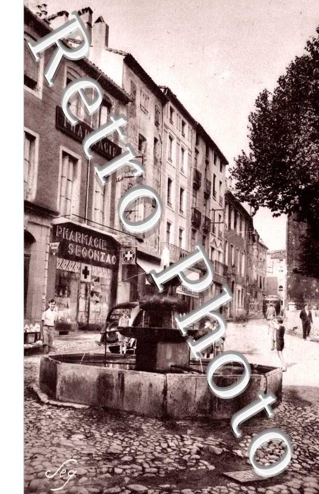 Place de Bonald - le "Griff" - vieille fontaine - Cevanole et la rue de l'horloge