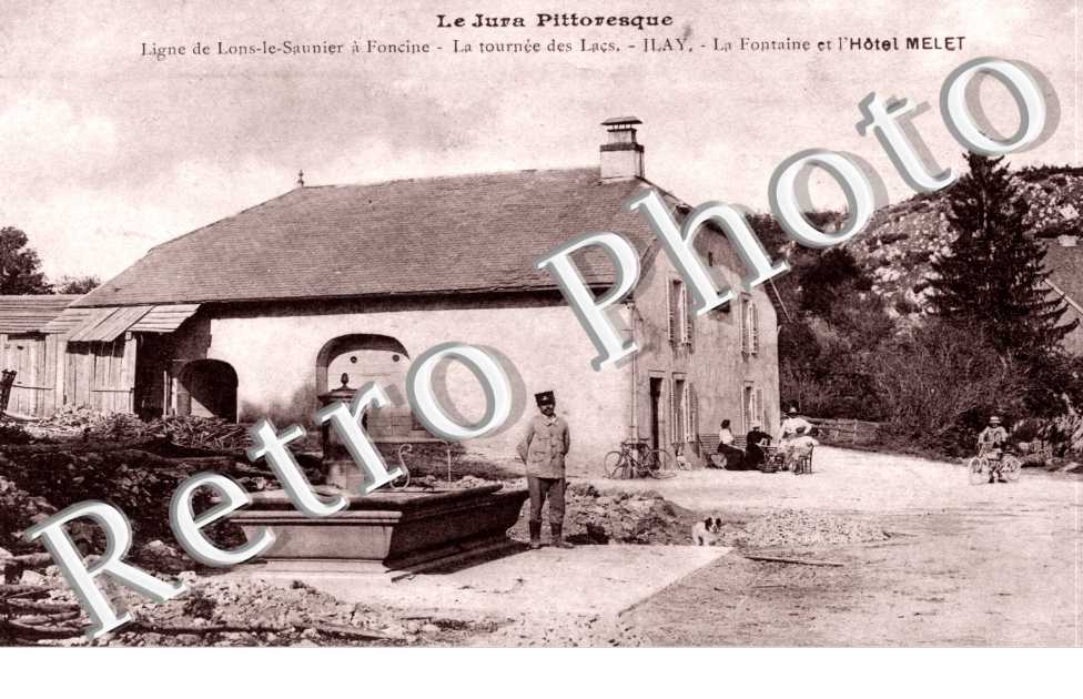 Ligne de Lons-le-saunier - la tournee des lacs - la fontaine et l'hotel Melet