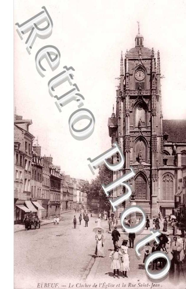 le clocher de l'eglise et la rue saint jean