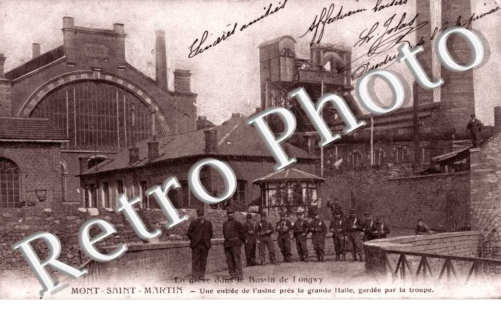 La greve dans le Bassin de Longwy - une entree de l'usine, pres la grande halle, gardee par la troupe