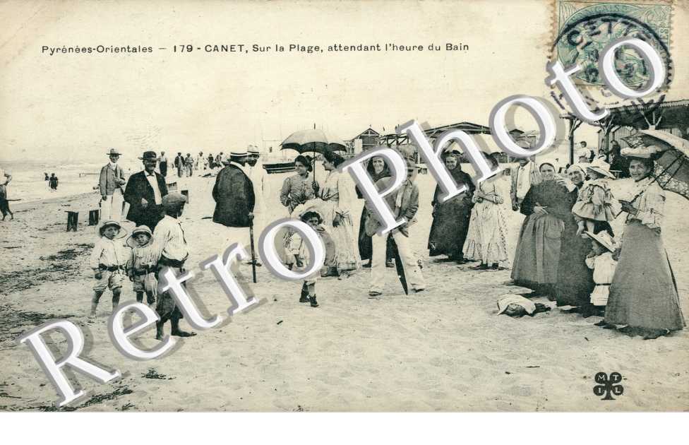 sur la plage, attendant l'heure du bain