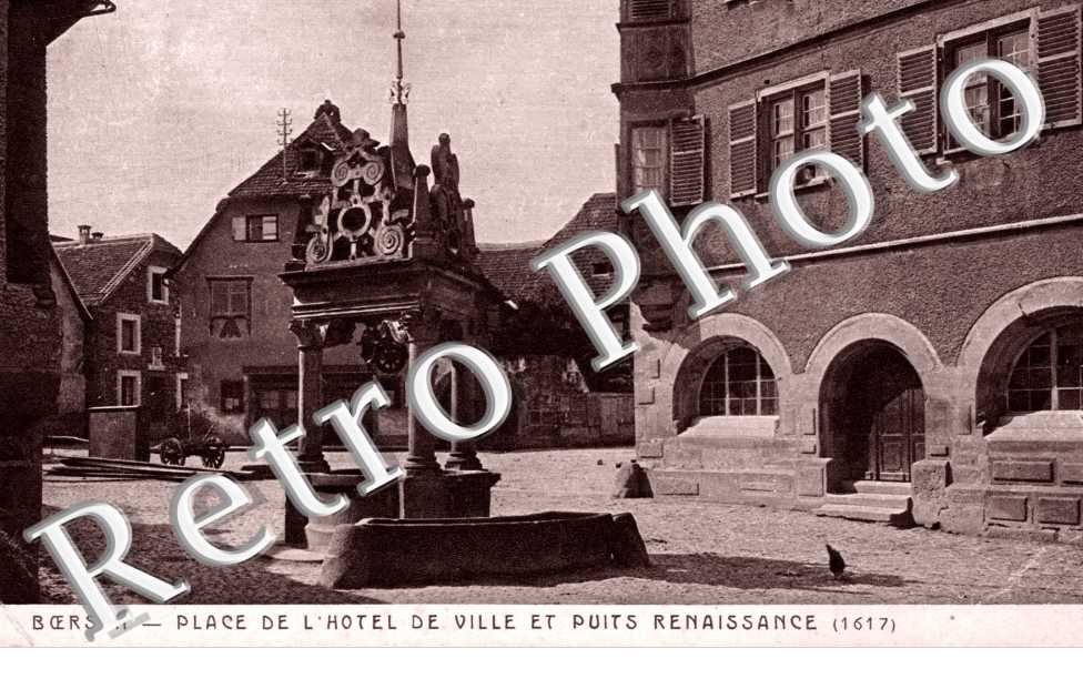 Place de l'hotel de ville et puits renaissance