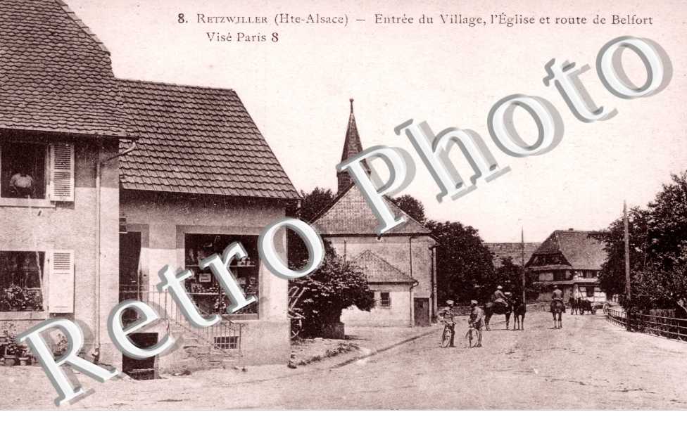 entree du village, l'eglise et route de Belfort