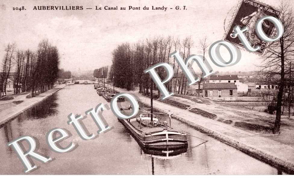 Le canal au pont du Landy (peniches)
