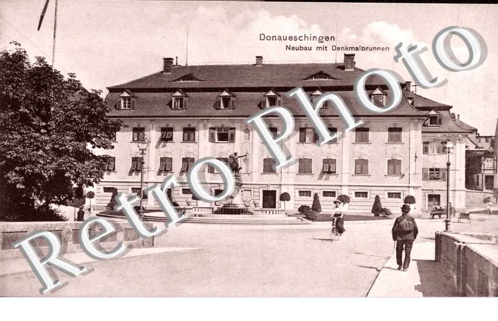 neubau mit denkmalbrunnen