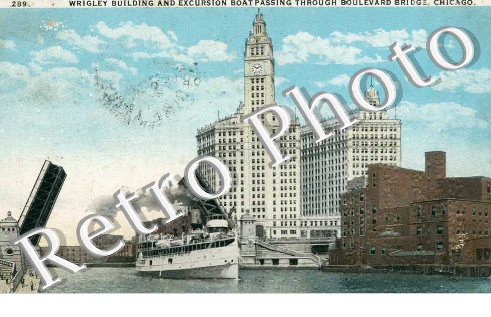 Wrigley building and Excursion boatpassing through Boulevard Bridge