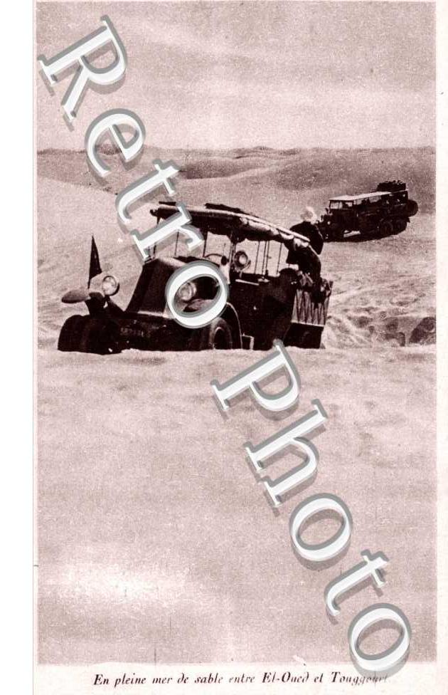 Auto en pleine mer de sable