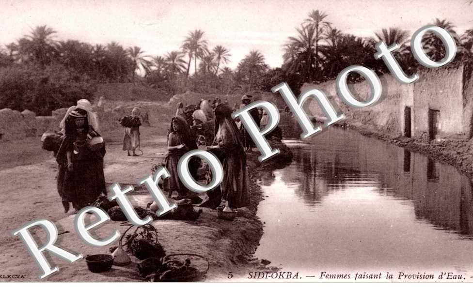 Femmes faisant la Provision d'Eau