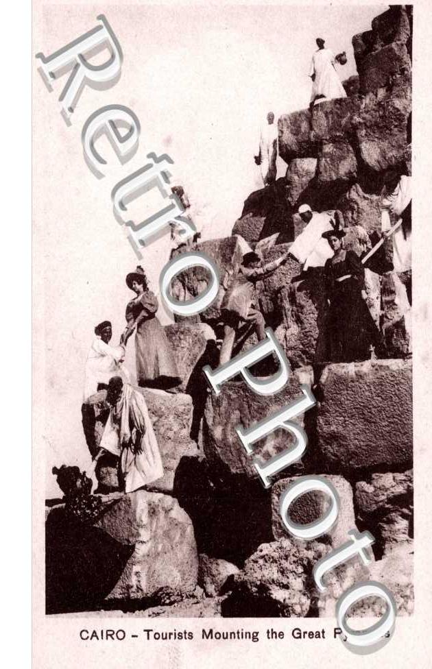 Tourists Mounting the Great Pyramids