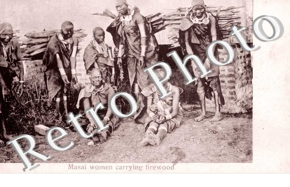 Masai women carrying firewood
