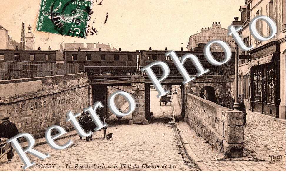 La rue de Paris et le pont du chemin de fer