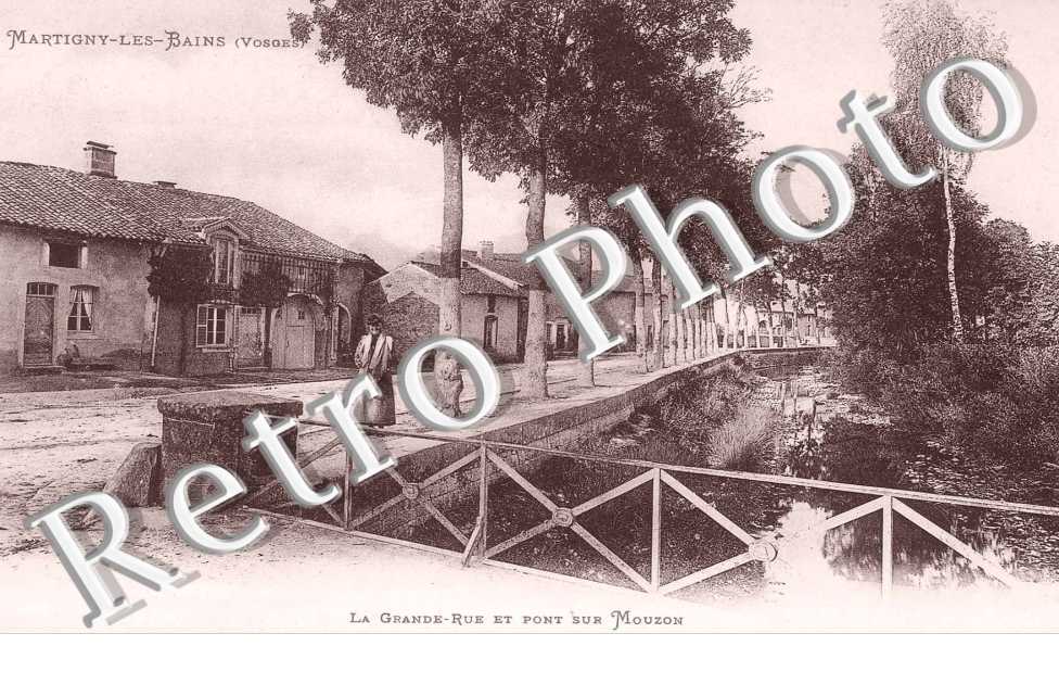 La grande rue et pont sur Mouzon