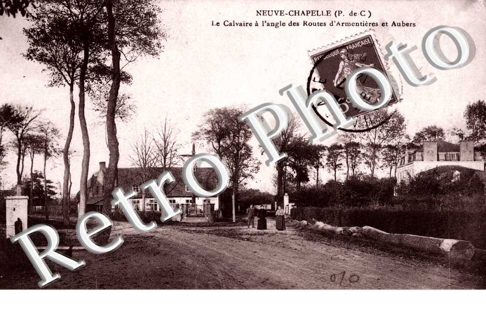 le Calvaire a l'angle des routes d'Armentieres et Aubers