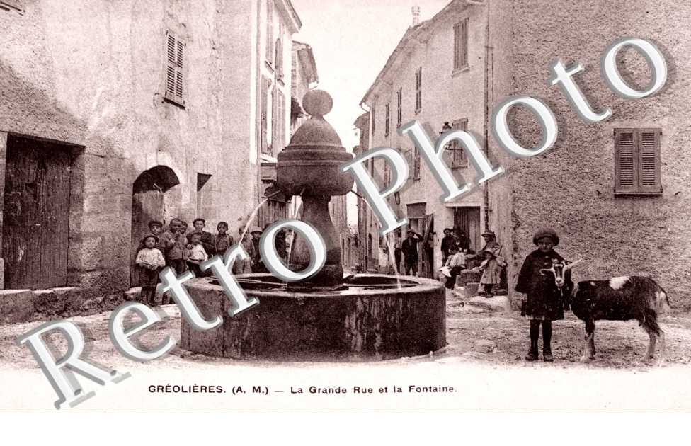 la grande rue et la fontaine