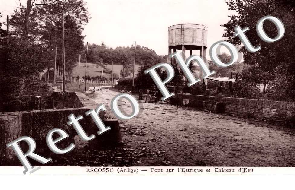 Pont sur l'Estrique et château d'eau