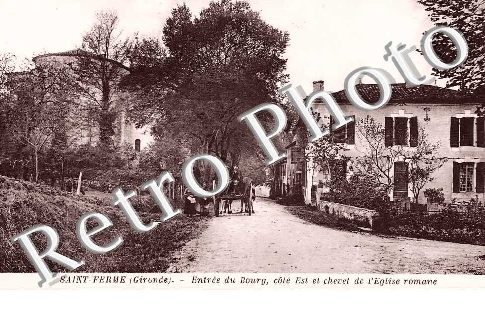 entrée du bourg  et chevet de l'église romane