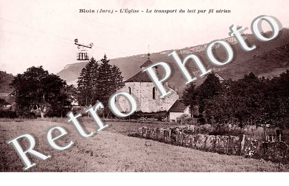 l'église. Le transport du lait par fil aérien