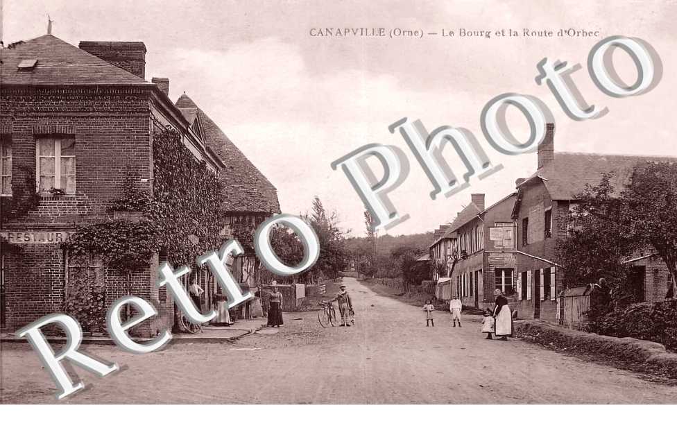 le bourg et la route d'Orbec
