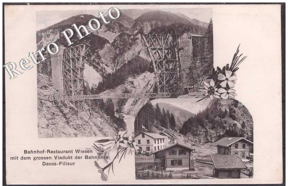Bahnhof Restaurant mit dem grossen Viadukt der Bahnllinie Davos-Filisur