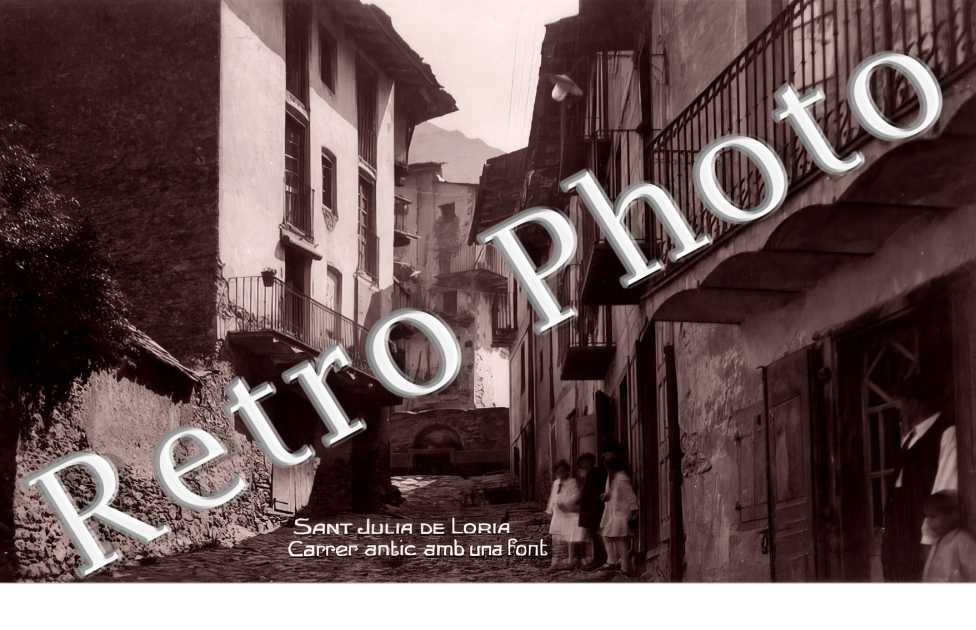 Sant Julia de Loria. Carrer antic amb una font